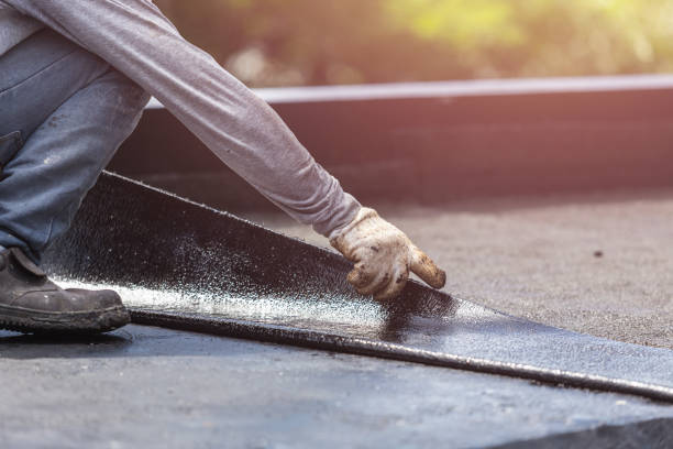 Professional Basement Waterproofing technician working in Sparta, KY